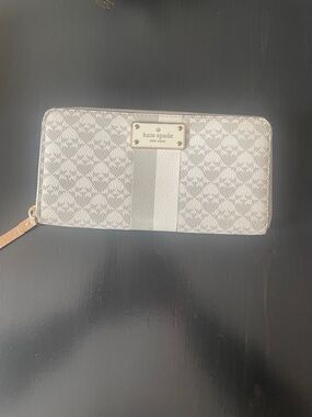 kate spade gray and White monogram zip wallet